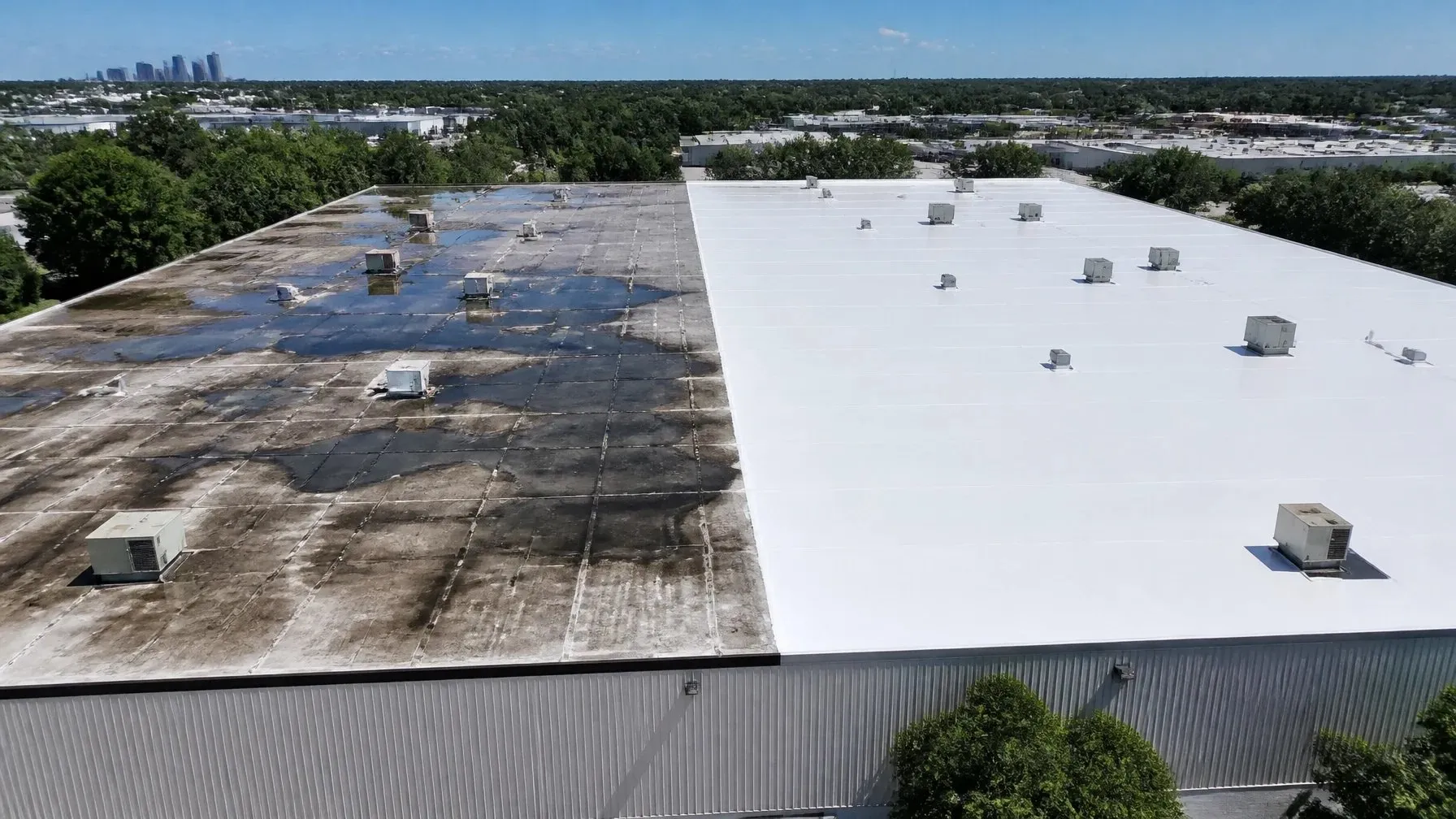 Bright white finished commercial storage roof after restoration